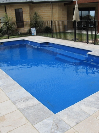New pool limestone paving